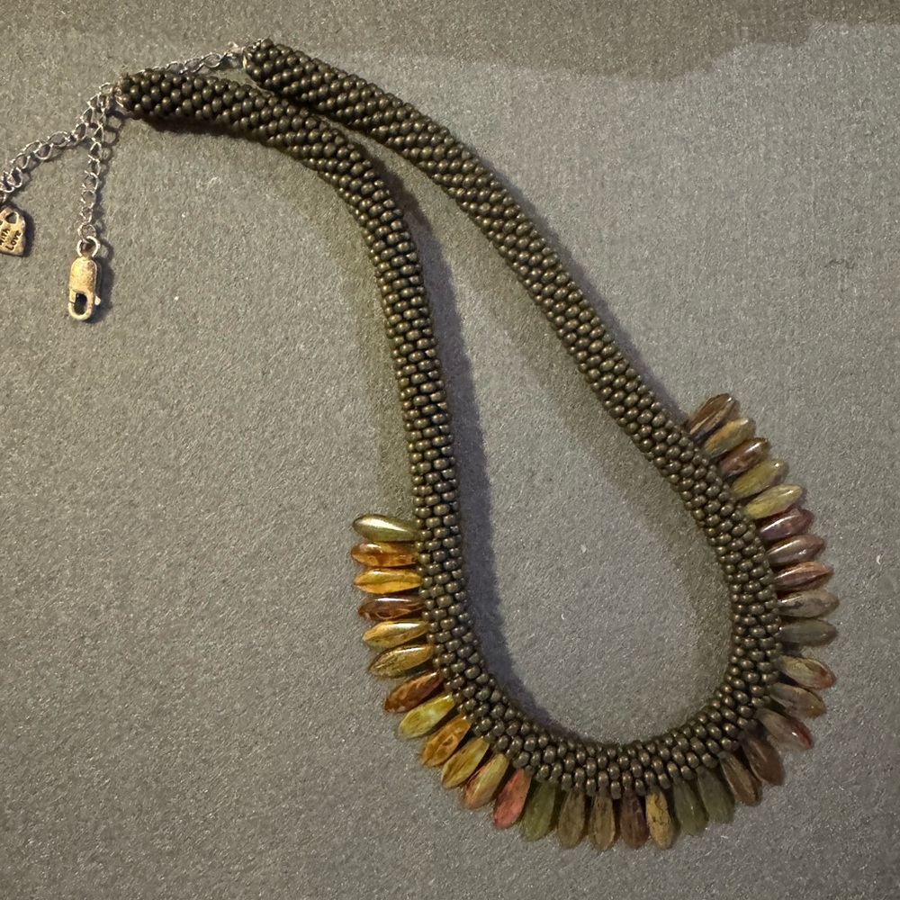 Beautiful beaded necklace with earth tone stones and Sterling silver 20.5" Chain
